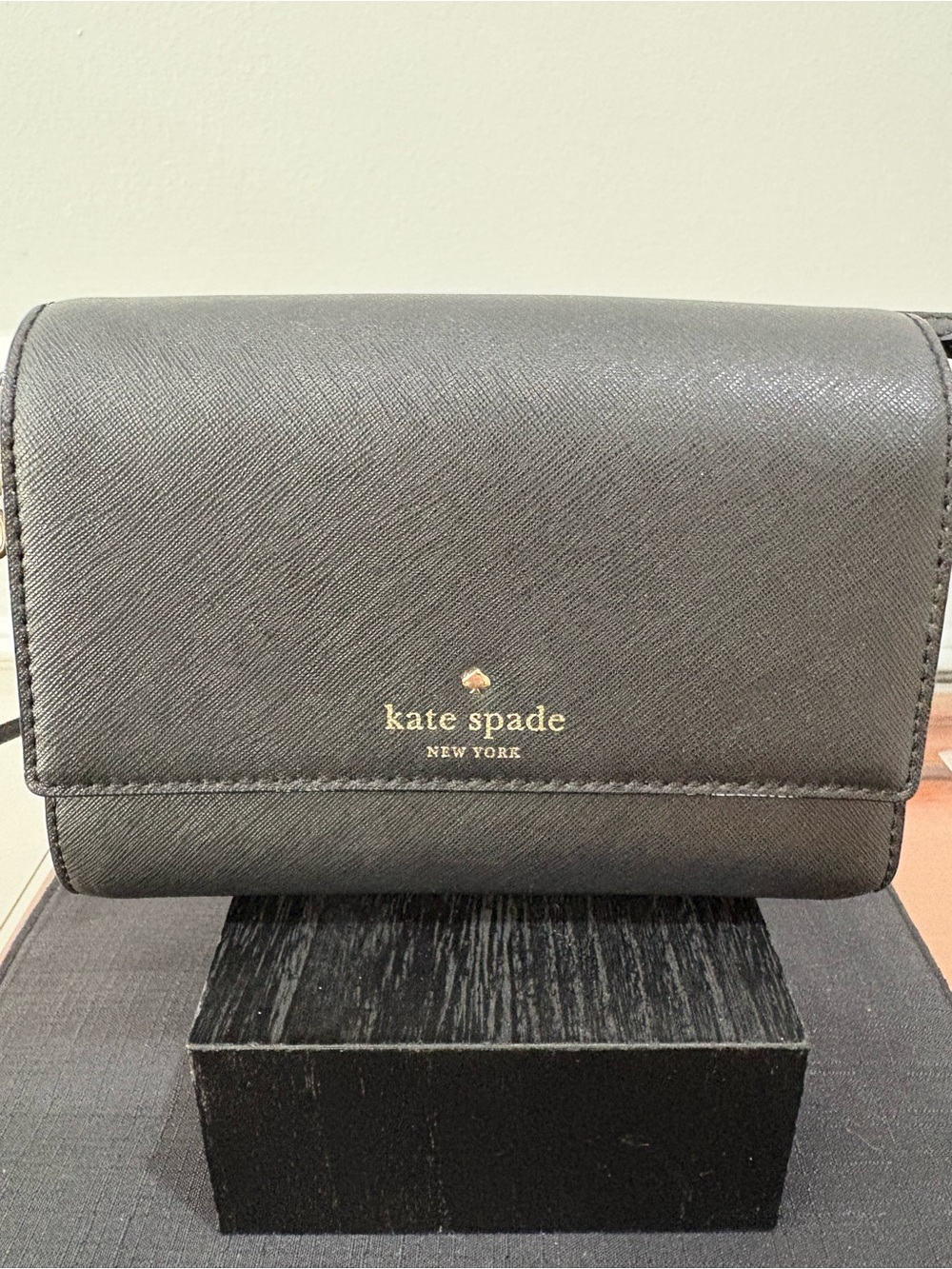 kate spade black saffiano leather crossbody with gold logo